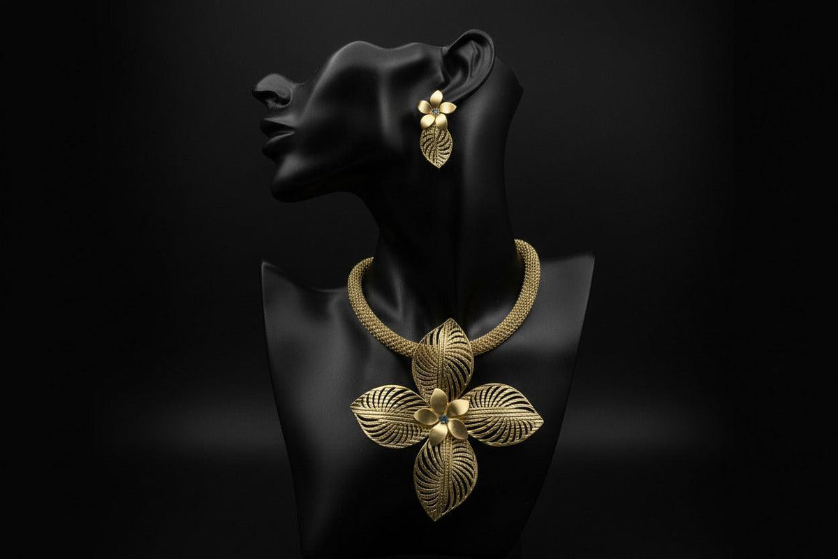 Gold floral jewelry set from BENTIX featuring intricate Brazilian-inspired floral designs, perfect for elegant accessories.