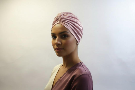 Nigerian pink and blue turban headwrap by BENTIX, featuring vibrant fabric and intricate design suitable for traditional wear
