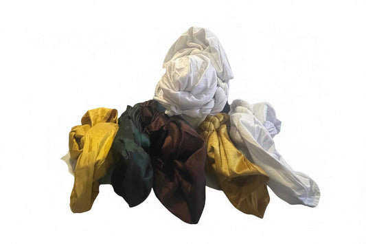 Colorful Nigerian Auto-Gele scrunchies in five vibrant designs featuring BENTIX branding, perfect for stylish hair accessories.