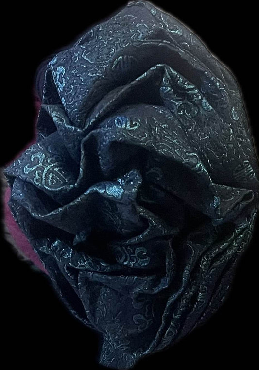 Pink Nigerian auto-Gele headwrap with damask pattern by BENTIX, showcasing intricate fabric design and elegant traditional styling.