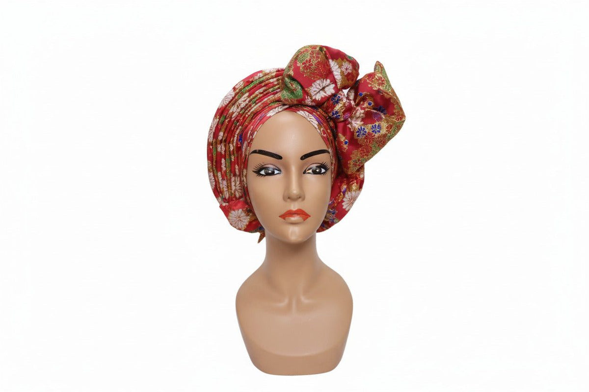 Nigerian auto-Gele headwrap with front bow pattern by BENTIX, showcasing vibrant fabric and stylish traditional headwrap design.