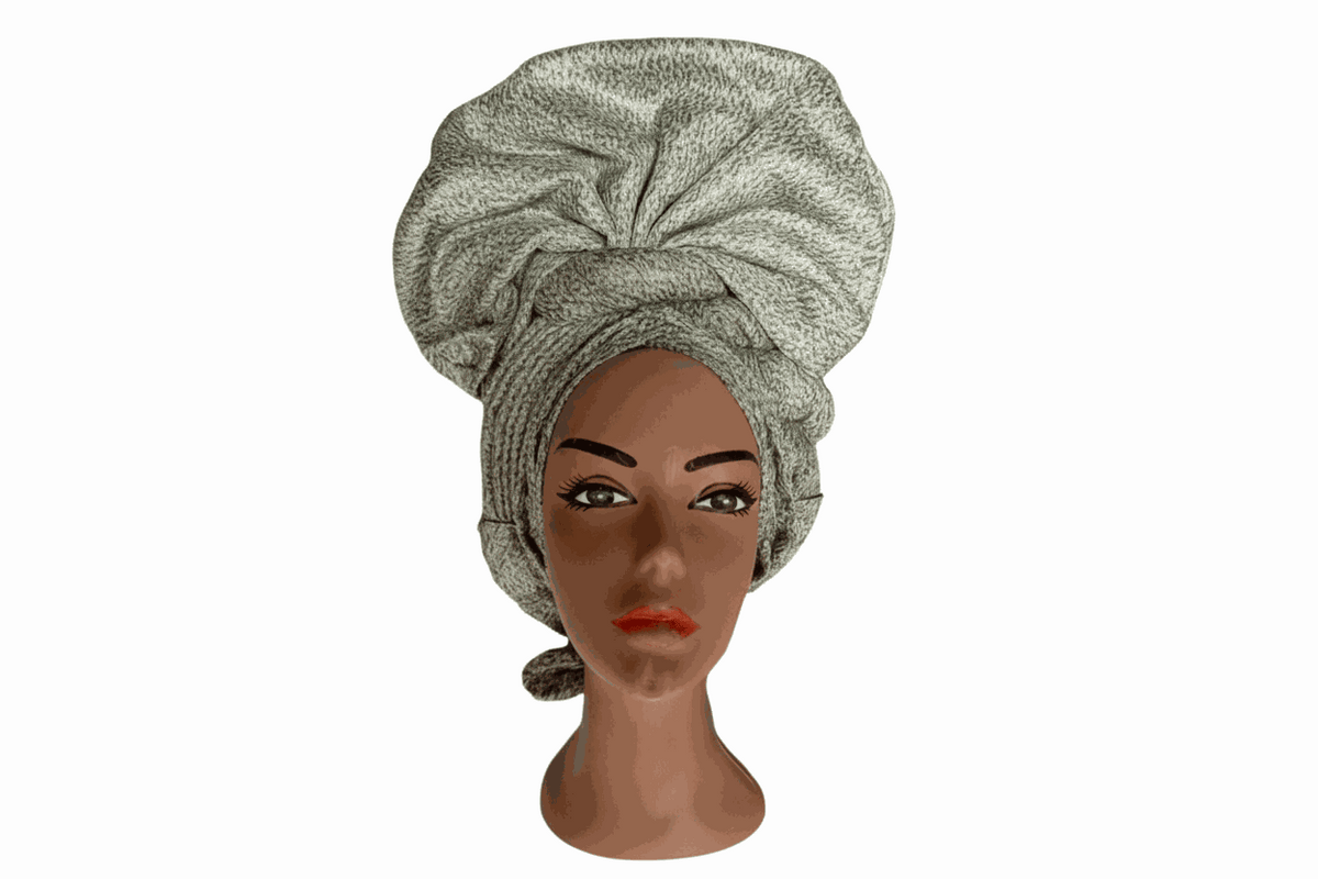 Bentix African Auto-Gele headties displayed in a row, showcasing vibrant, traditional fabric designs and bold patterns.