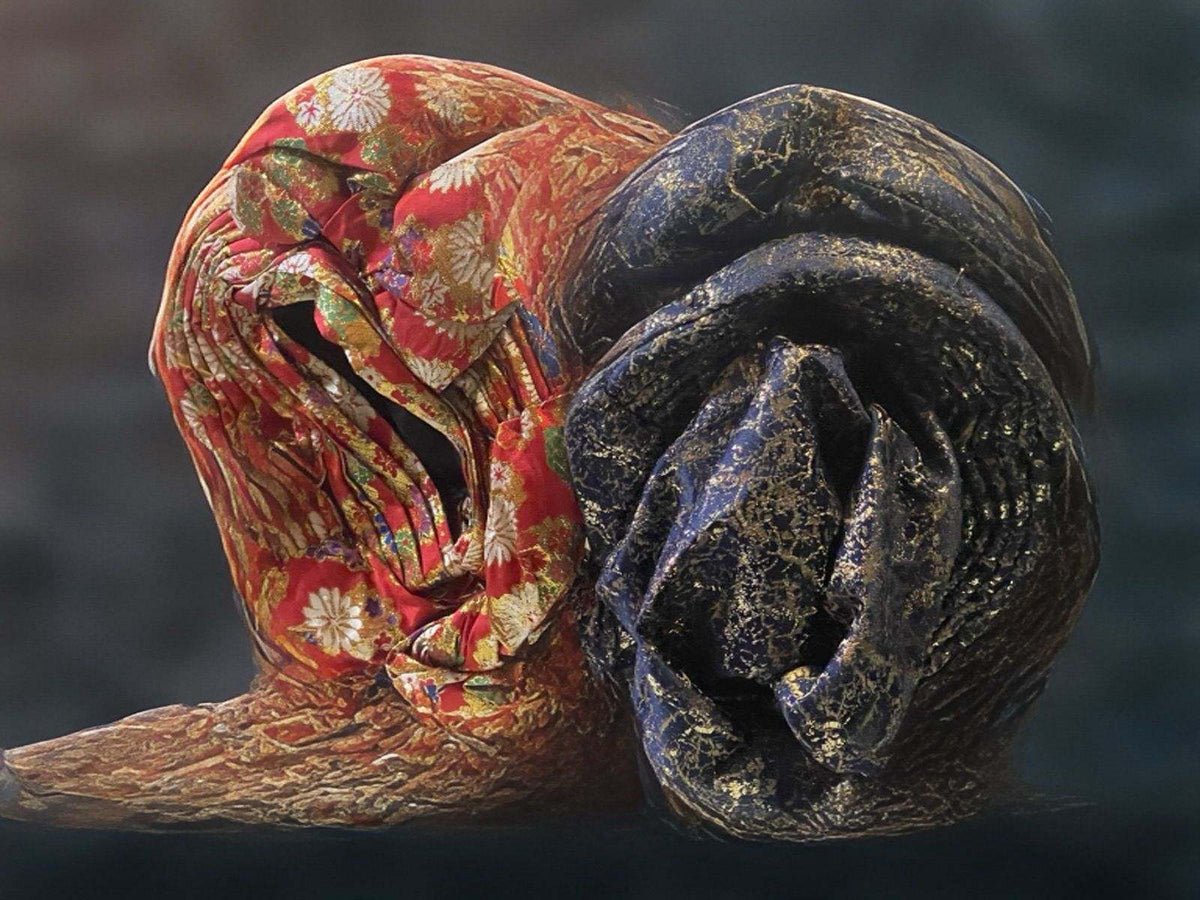 Colorful Bentix African auto-gele headties in two vibrant colors, styled for traditional and fashionable occasions.