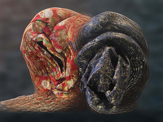 Colorful Bentix African auto-gele headties in two vibrant colors, styled for traditional and fashionable occasions.
