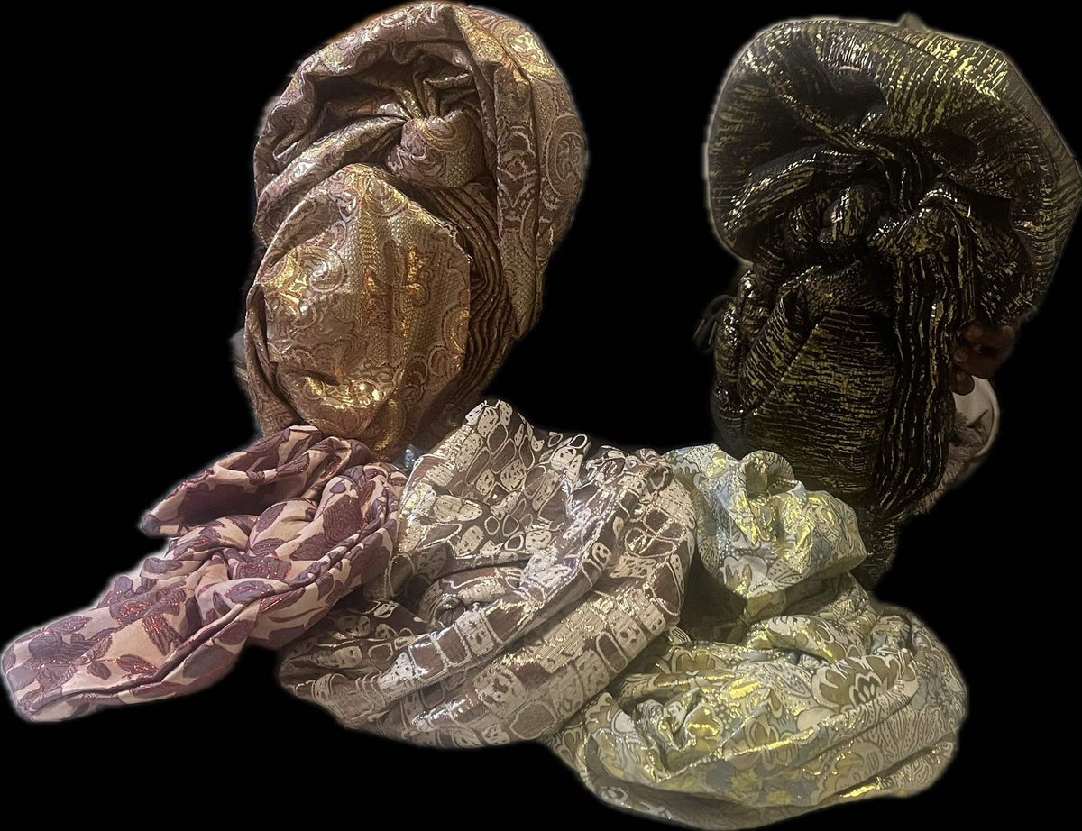 Colorful Bentix African auto-gele headties arranged in five vibrant shades, showcasing traditional headwrap styles and intricate fabric patterns.