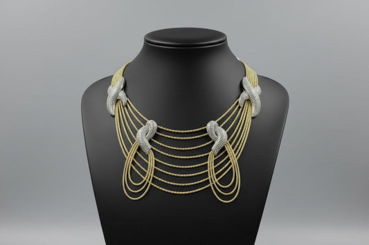 Bentix Brazilian round gold and silver layered jewelry set featuring matching earrings and necklaces.