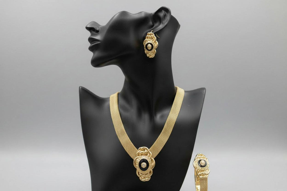 Gold Bentix Brazilian Gold necklace with decorative elements, featuring intricate gold accents and elegant design.
