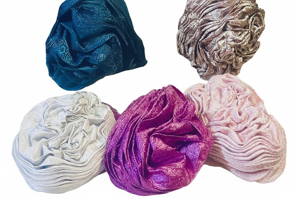 Pink Nigerian auto-Gele headwrap with damask pattern by BENTIX, showcasing intricate fabric design and elegant style.
