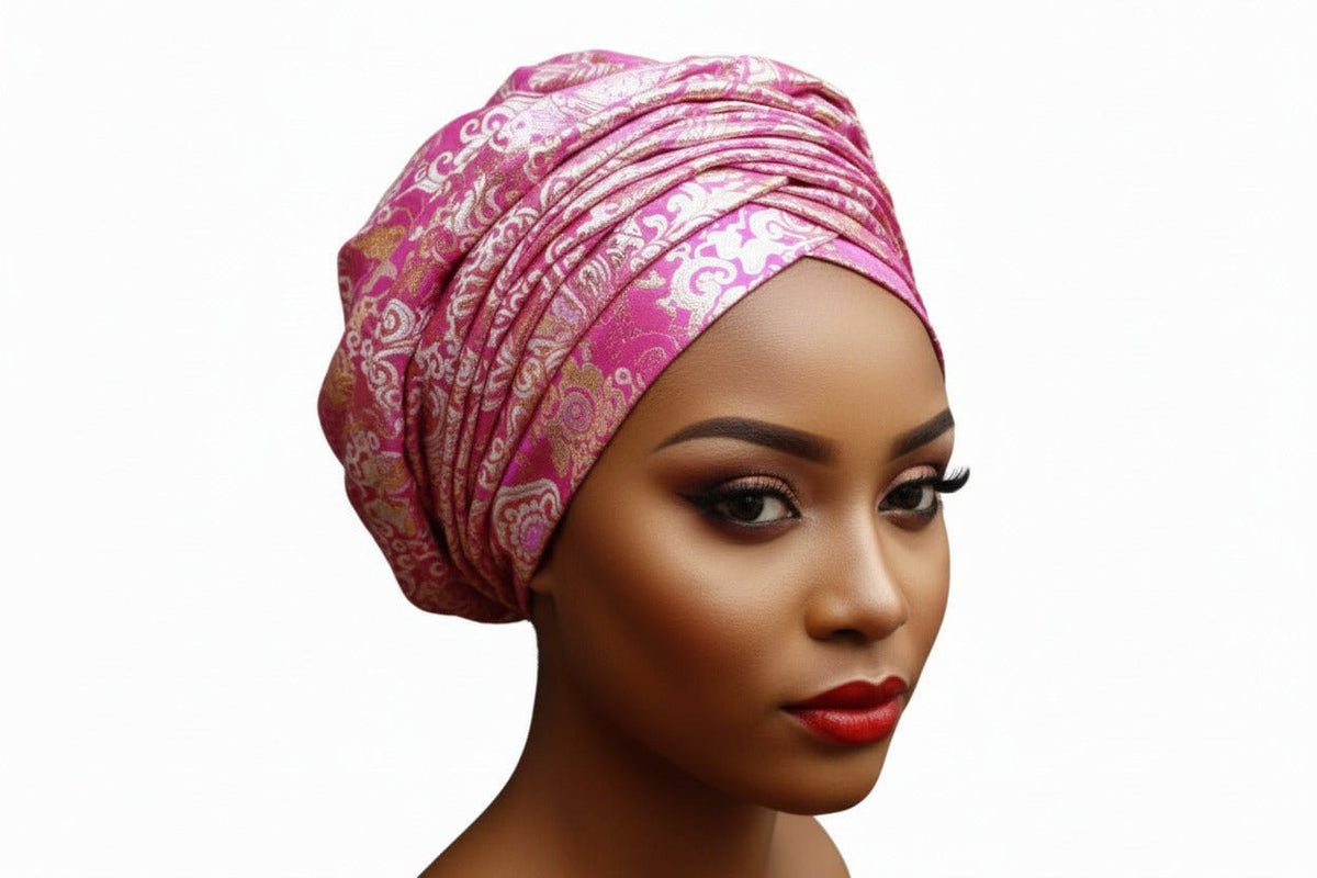 Pink damask pattern Nigerian Auto-Gele headwrap by BENTIX, showcasing traditional style and intricate fabric design.