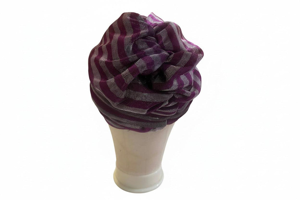 Purple and white striped Nigerian turban by BENTIX, featuring traditional fabric and stylish headwrap design.