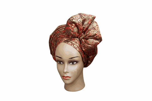 Red-brown Nigerian Auto-gele headtie with front bow by Bentix, showcasing intricate pattern and elegant wrap for traditional occasions.