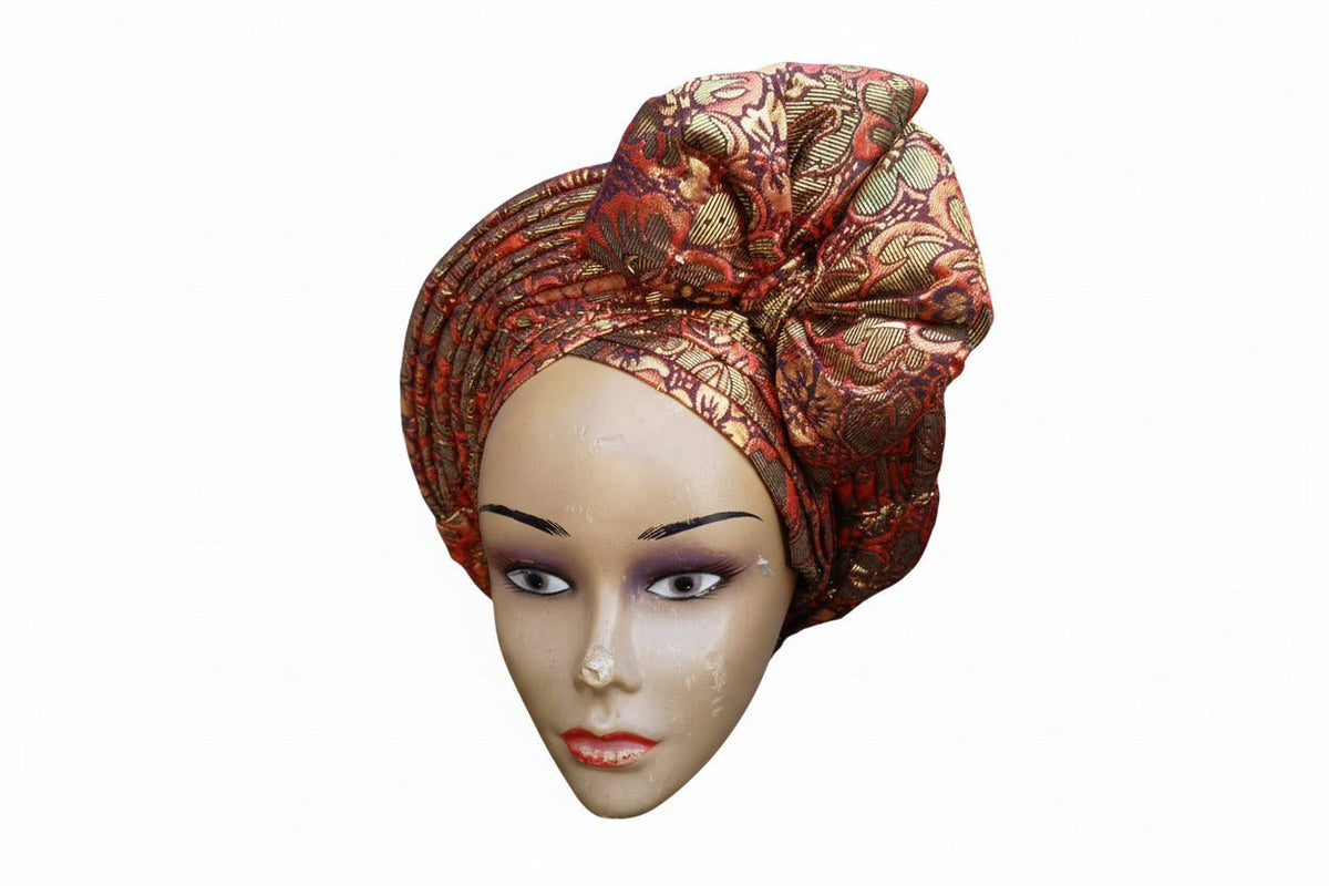 Nigerian Auto-Gele headwrap with front bow pattern by BENTIX, showcasing intricate fabric design and stylish traditional fashion.