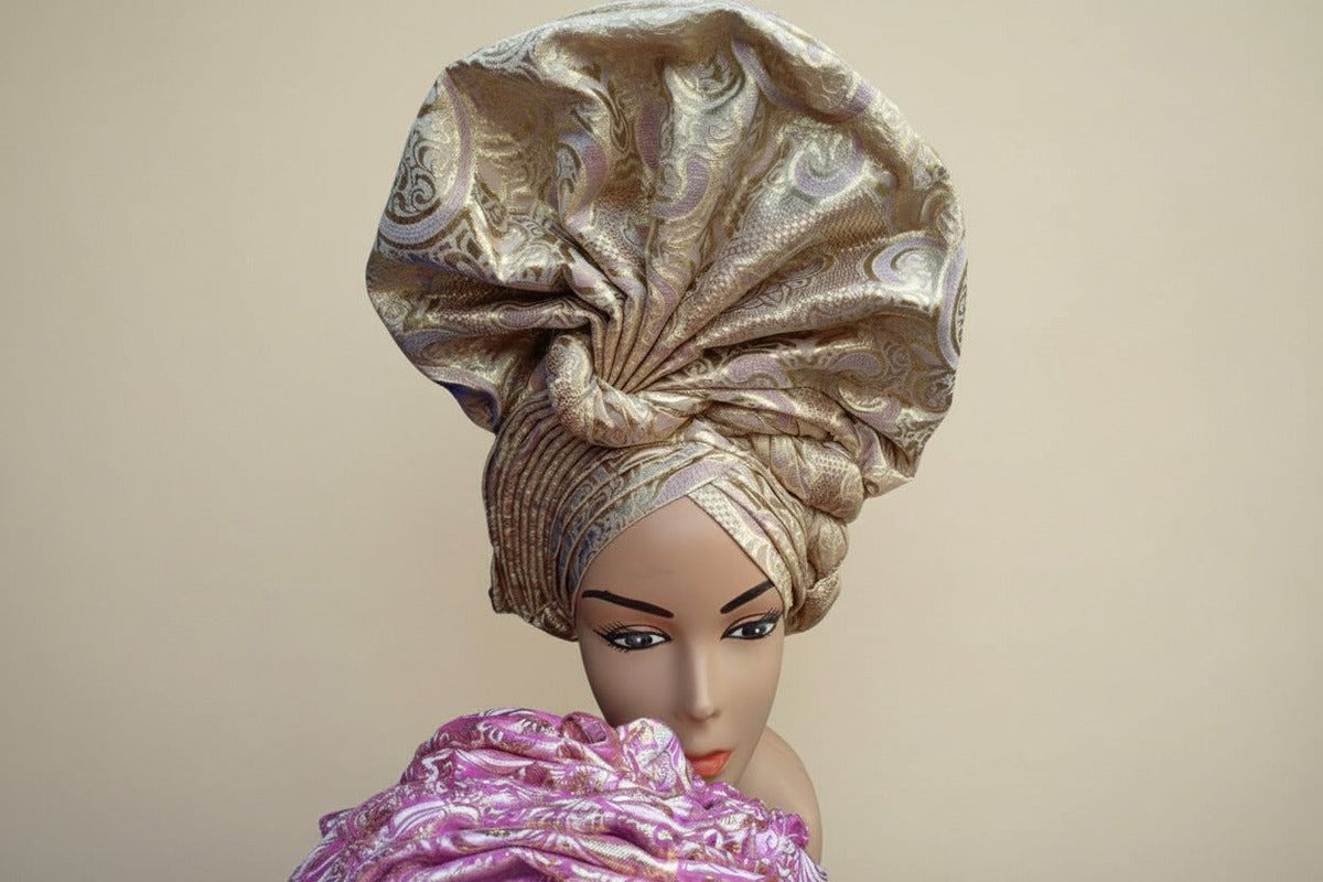 Nigerian auto-Gele headtie by BENTIX with silver glitter accents, styled with intricate folding and elegant design.